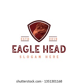 Vintage Eagle head logo design with shield badge - vector