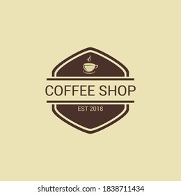 vintage elegant coffee shop logo vector with hot coffee in the cup