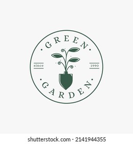 Vintage elegant garden logo, gardening vector with with shovel and growing plant concept