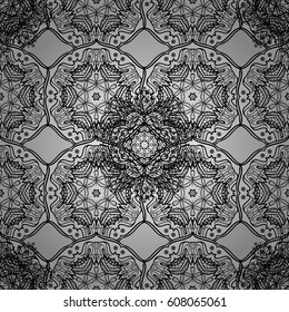 Vintage element on gray background. Antique gray repeatable wallpaper. Gray floral ornament in baroque style. Damask seamless pattern repeating background.