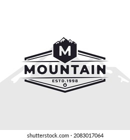 Vintage Emblem Badge Letter M Mountain Typography Logo for Outdoor Adventure Expedition, Mountains Silhouette Shirt, Print Stamp Design Template Element