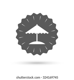 Vintage emblem medal. Beach umbrella sign icon. Protection from the sun. Classic flat icon. Vector