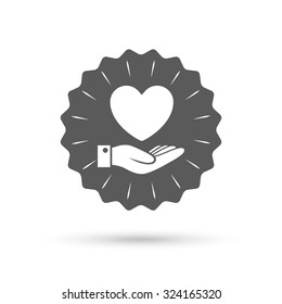 Vintage emblem medal. Heart and hand sign icon. Palm holds love symbol. Classic flat icon. Vector