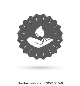 Vintage emblem medal. Save water sign icon. Hand holds water drop symbol. Environmental protection symbol. Classic flat icon. Vector