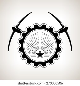 Vintage emblem of the mining industry, label and badge mining, black and white vector illustration