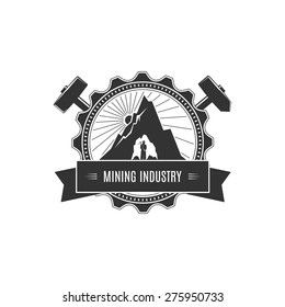 Vintage Emblem of the Mining Industry, Miner Holding a Pickax on a Background of the Sunburst and Mountain, Label and Badge Mine Shaft, Vector Illustration