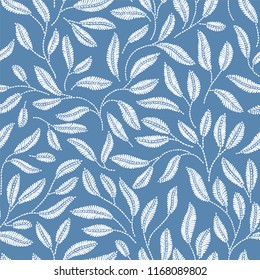 Vintage embroidery floral fabric texture. Simple seamless background with leaves, branches. Embroidery stitches imitation.