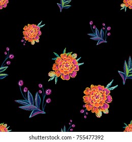 Vintage embroidery marigold flowers with floral branches seamless pattern. Bright traditional illustration on black background for fabric design in watercolor style.