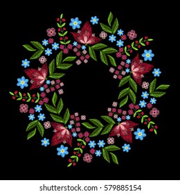 Vintage embroidery wreath with spring pink flowers forget me not for decor. Vector fashion ornament on black background for textile, fabric traditional folk decoration.