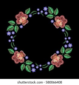 Vintage embroidery wreath with viola forget me not. Vector fashion ornament on black background for textile, fabric traditional folk decoration.