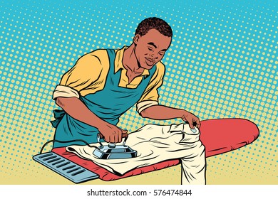 Vintage employee ironed clothes. pop art retro vector illustration. Homework and service in the hotel. African American people