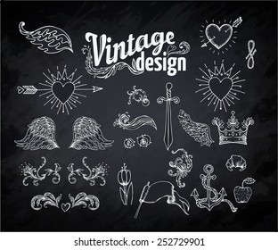 Vintage engraved decorative ornate vector design elements. Chalk illustration over a blackboard 