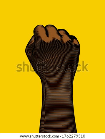 Vintage engraved drawing back of black human hand fist gesture vector illustration dark lighting woodcut style isolated on yellow background