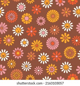 Vintage floral background. Hippie style vector seamless pattern. Nostalgic retro 70s groovy print. Textile and surface design in old fashioned colors