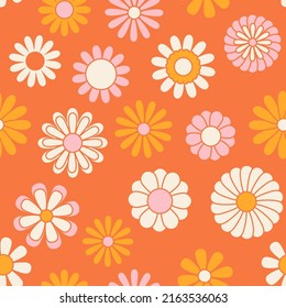 Vintage floral background. Hippie style vector seamless pattern. Nostalgic retro 70s groovy print. Textile and surface design in old fashioned colors