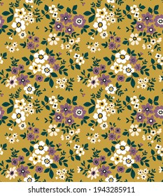 Vintage floral background. Floral pattern with small white and violet flowers on a yellow gold background. Seamless pattern for design and fashion prints. Ditsy style. Stock vector illustration.