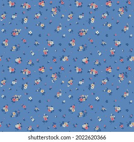 Vintage floral background. Floral pattern with small pastel color  flowers on a bright blue background. Seamless pattern for design and fashion prints. Ditsy style. Stock vector illustration.