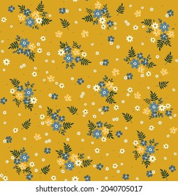 Vintage floral background. Floral pattern with small flowers on a yellow mustard background. Seamless pattern for design and fashion prints. Ditsy style. Stock vector illustration.