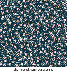 Vintage floral background. Floral pattern with small white flowers on a dark blue background. Seamless pattern for design and fashion prints. Ditsy style. Stock vector illustration.

