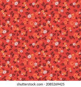 Vintage floral background. Floral pattern with small orange, white and yellow flowers on a terracotta background. Seamless pattern for design and fashion prints. Ditsy style. Stock vector illustration