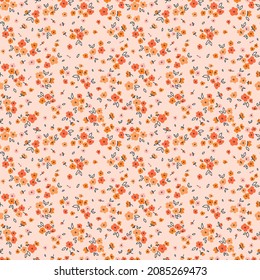 Vintage floral background. Floral pattern with small coral orange flowers on a salmon background. Seamless pattern for design and fashion prints. Ditsy style. Stock vector illustration.