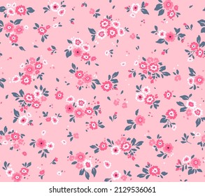 Vintage floral background. Floral pattern with small pink flowers on a pale pink background. Seamless pattern for design and fashion prints. Ditsy style. Stock vector illustration.