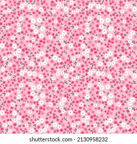 Vintage floral background. Floral pattern with small white and pink flowers on a light pink background. Seamless pattern for design and fashion prints. Ditsy style. Stock vector illustration.