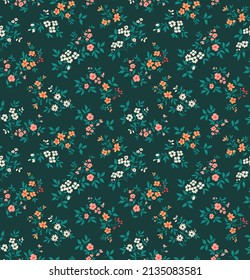 Vintage floral background. Floral pattern with small colorful flowers on a dark green background. Seamless pattern for design and fashion prints. Ditsy style. Stock vector illustration.