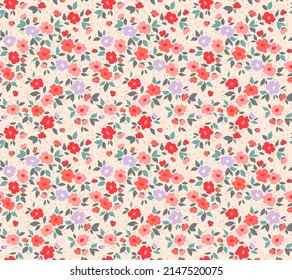 Vintage floral background. Floral pattern with small pink and red flowers on a light ivory peach background. Seamless pattern for design and fashion prints. Ditsy style. Stock vector illustration.
