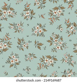 Vintage floral background. Floral pattern with small white flowers on a pale blue background. Seamless pattern for design and fashion prints. Ditsy style. Stock vector illustration.