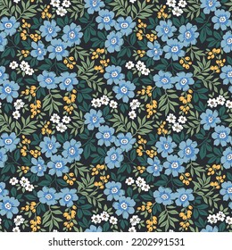 Vintage, floraler Hintergrund. Blumenmuster mit kleinen blauen Blumen auf dunkelblauem Hintergrund. Nahtlose Muster für Design- und Modedrucke. Ditsy-Stil. Stock-Vektorgrafik.