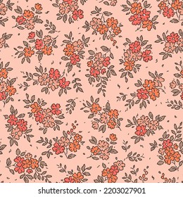 Vintage floral background. Floral pattern with small red and orange flowers on a pink background. Seamless pattern for design and fashion prints. Ditsy style. Stock vector illustration.