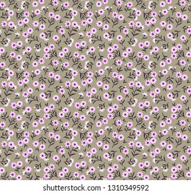 Vintage floral background. Seamless vector pattern for design and fashion prints. Flowers pattern with small white flowers on a graybackground. Ditsy style.