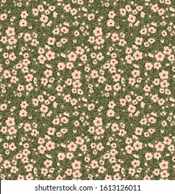 Vintage floral background. Seamless vector pattern for design and fashion prints. Flowers pattern with small pink flowers on a green background. Ditsy style.