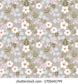 Vintage floral background. Seamless vector pattern for design and fashion prints. Flowers pattern with small white flowers on a gray background. Ditsy style.