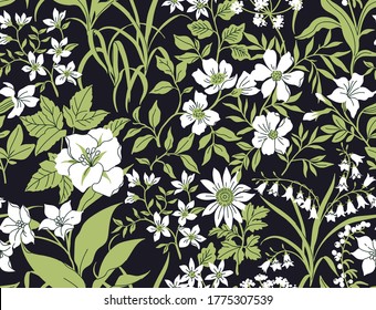 Vintage floral background. Seamless vector pattern for design and fashion prints. Modern pattern with small white flowers on a black background. Liberty style.