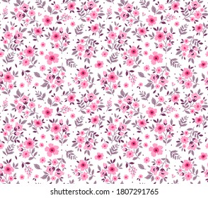 Vintage floral background. Seamless vector pattern for design and fashion prints. Flowers pattern with small pink flowers on a white background. Ditsy style.