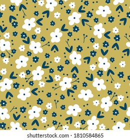 Vintage floral background. Seamless vector pattern for design and fashion prints. Floral pattern with white flowers on a mustard background.