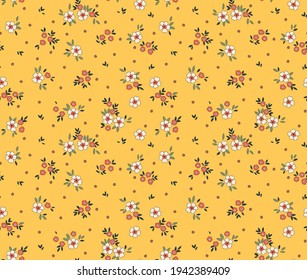 Vintage floral background. Seamless vector pattern for design and fashion prints. Flowers pattern with small white and red flowers on a light yellow background. Ditsy style. Stock vector.