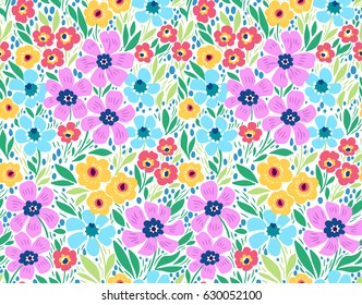 Vintage floral background. Seamless vector pattern for design and fashion prints. Flowers pattern with small colorful flowers on a white background. Ditsy style. 