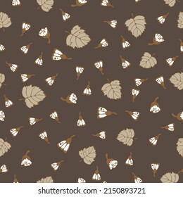 Vintage floral pattern. Seamless pattern with small white flowers on a branch and leaves, varied foliage on a brown background. Botanical print with autumn mood. Vector print