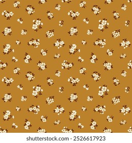 Vintage floral pattern in small abstract flowers. Small ivory white flowers. Gold yellow background. Ditsy print. Floral seamless background. Retro template for fashion prints. Stock 