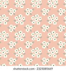 Patrón floral vintage con flores pequeñas sobre un fondo beige. Ideal para papel pintado, fondo, embalaje, tela, scrapbook