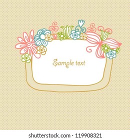 Vintage frame from hand drawn flowers on polka dot background