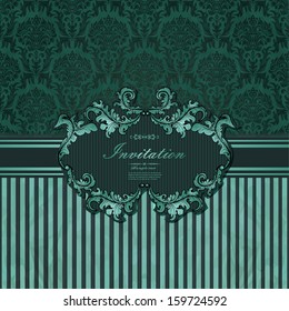 Vintage frame on damask wallpaper