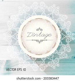 Vintage frame on a realistic wood texture , vector