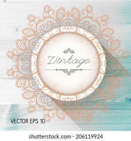 Vintage frame on a realistic wood texture , vector