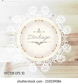 Vintage frame on a realistic wood texture , vector