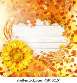 Vintage frame with place for text and sunflower with autumn leaves on a beautiful natural background. EPS 10 vector file included