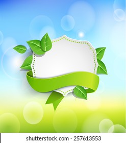 Vintage frame wit green  ribbon against the  paper leaves and spring bokeh background. Vector illustration. 